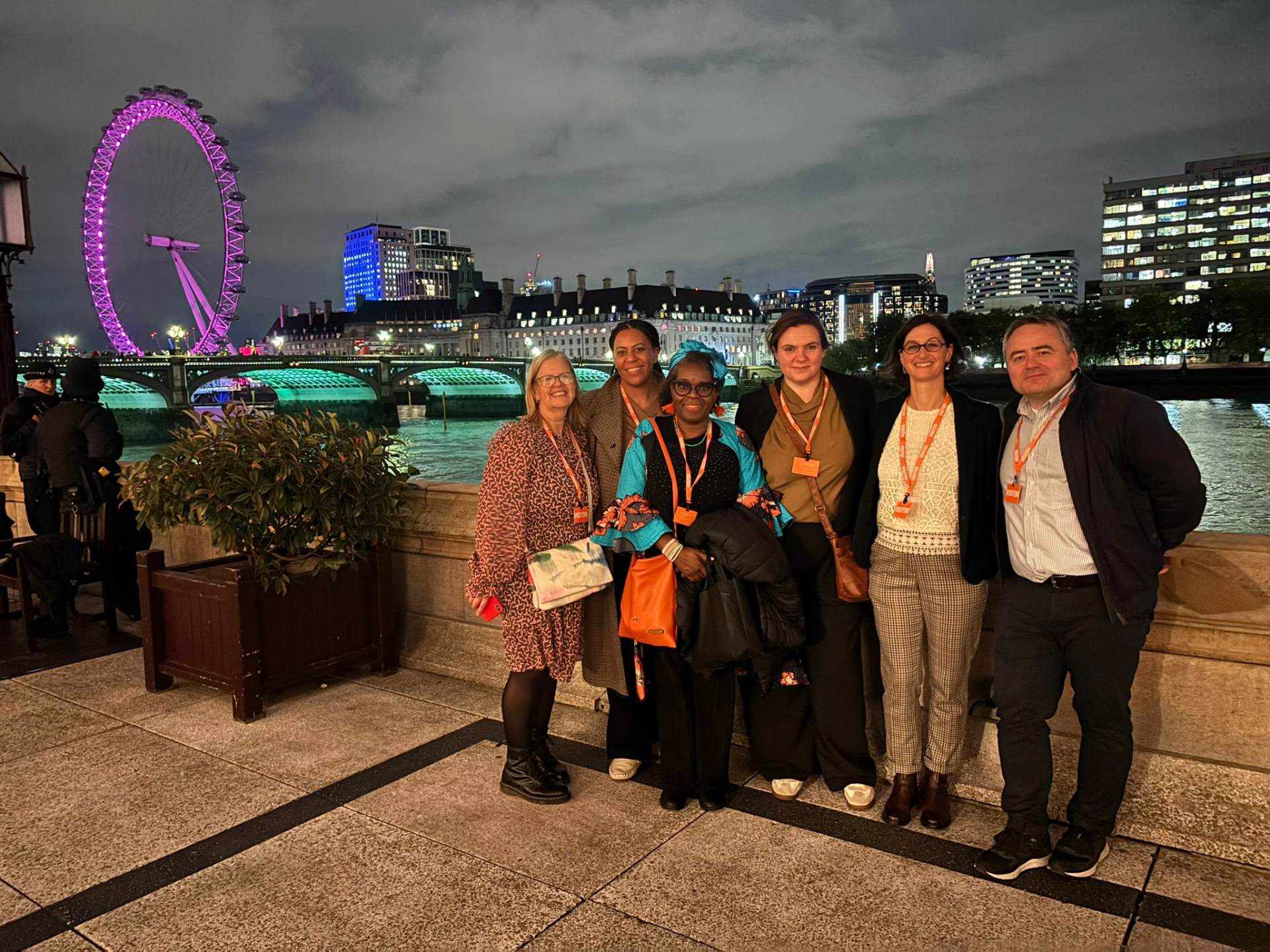 Mrs Khan in the centre, with colleagues and fellow residents